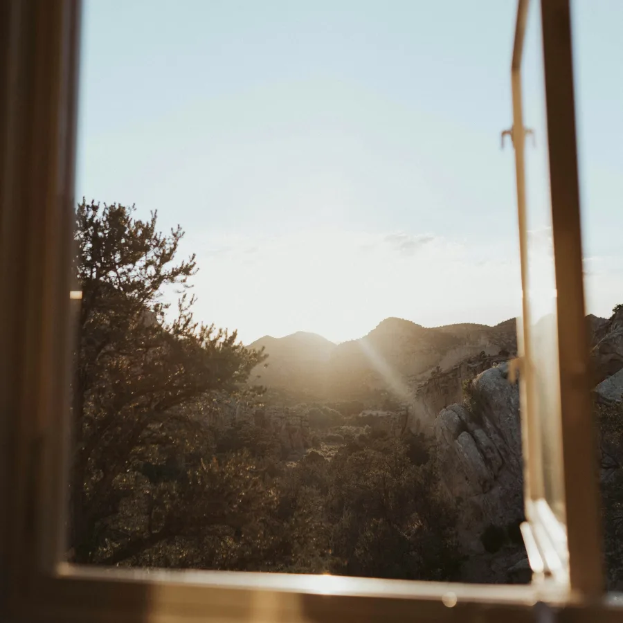 Window ajar with daylight coming into the room