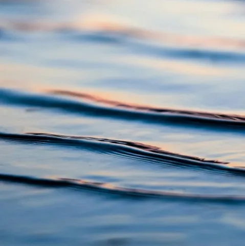 Rippled water surface, calm reflections